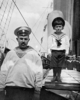 The little Caesarevitch with his sailor friend, 1908.Artist: Queen Alexandra The little Caesarevitch with his sailor friend, 1908.Artist: Queen Alexandra
