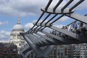 Prints of Millenium (Wobbly). Bridge, London, England, UK, 3/9/10. The London Millennium Footbridge over the River Thames, designed by Norman Foster and completed in 2000 Millennium Bridge Prints: Heritage Images Print: London Millennium Footbridge, 2000