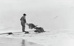 Black And White Mining Images Prints: Mining on beach, between c1900 and c1930. Creator: Unknown