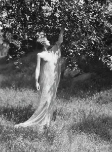 Vintage Astronomy Images Prints: Olson, Margaret, Miss, standing outdoors, 1924 July. Creator: Arnold Genthe