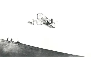 Wilbur And Orville Wright Brothers Prints: Orville Wright tests his glider at Kitty Hawk, North Carolina, USA, 1911. Creator: NASA