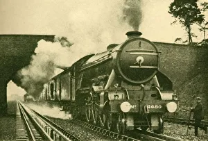 Locomotive Photography Prints: A Pacific Engine Picking Up Water at the Rate of 2, 500 Gallons in Ten Seconds - London