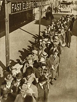 Passengers waiting at Goldhawk Road Station in London during the railway strike, 1919, (1935) Passengers waiting at Goldhawk Road Station in London during the railway strike, 1919, (1935)