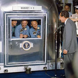 Pesident Nixon visits Apollo 11 crew in quarantine. Creator: NASA Pesident Nixon visits Apollo 11 crew in quarantine. Creator: NASA