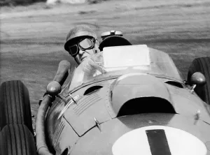 National Motor Museum Photos Prints: Peter Collins in a Ferrari