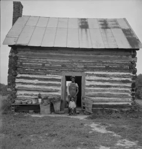 Racial Inequality In Agriculture Prints: Possibly: Young sharecropper and his first child