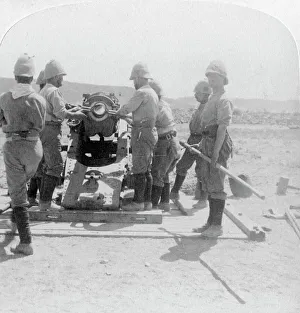 British Army In South Africa Prints: Putting a shell into a siege train gun at the Modder River