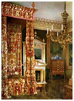 Queen Annes bed, chest of drawers upon a stand and a wooden candelabra, 1910.Artist: Edwin Foley Queen Annes bed, chest of drawers upon a stand and a wooden candelabra, 1910.Artist: Edwin Foley