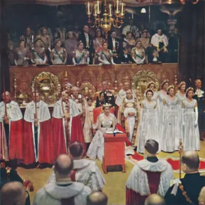 The Queen, after her entry into the Abbey Church of Westminster, is seated in her The Queen, after her entry into the Abbey Church of Westminster, is seated in her