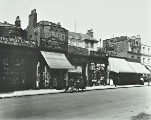 Kensington High Street History Prints: Row of shops including the West London Workshops for the Blind, London, 1913