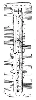 Saxon Comb Print (1910) - A worn wooden comb with several missing teeth