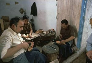 Kairouan Collection: Shoemakers in a Tunisian souk