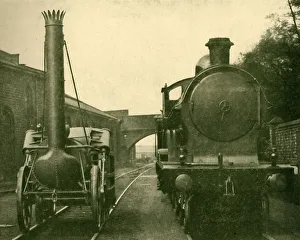 British Railway Heritage Photos Prints: A full size model of Stephensons Rocket alongside an engine of the George