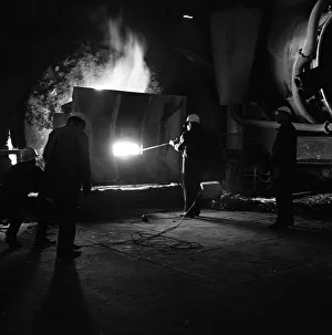 Michael Walters Photography Prints: Testing temperature of molten steel, Park Gate Iron & Steel Co, Rotherham, South Yorkshire