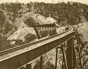 Monochrome Train Photography Prints: Train Passing Over Viaduct, Mount Lofty Range, South Australia, 1930. Creator: Unknown