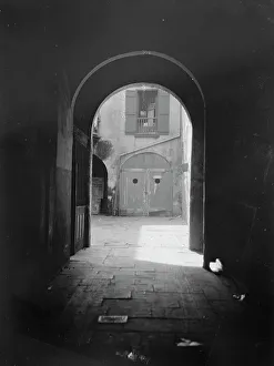 New Orleans Architecture Prints: View of a courtyard through an arched passageway