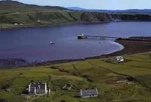 Village of Uig, and Jetty for ferry to outer Hebrides, Isle of Skye, Scotland, 20th century. Artist: CM Dixon Village of Uig, and Jetty for ferry to outer Hebrides, Isle of Skye, Scotland, 20th century. Artist: CM Dixon