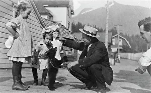 Early 20th Century Print of White People with Bear Cub