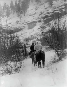 Black And White Winter Landscape Prints: Winter hunter[s]-Apsaroke, c1908. Creator: Edward Sheriff Curtis
