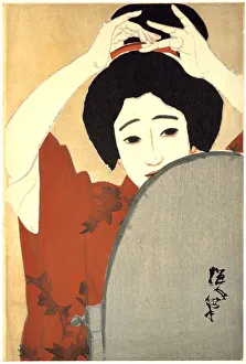 Woman Adjusting Her Hair in Front of the Mirror, 1930. Artist: Kitano Tsunetoni Woman Adjusting Her Hair in Front of the Mirror, 1930. Artist: Kitano Tsunetoni