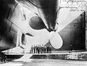 Workmen under Titanic Propeller, 31 May 1911 Print (b/w)