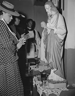 Worshipper before the altar of the St. Martin's Spiritual Church, Washington, D.C. 1942. Creator: Gordon Parks Worshipper before the altar of the St. Martin's Spiritual Church, Washington, D.C. 1942. Creator: Gordon Parks