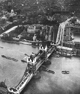 Aerial view of Tower Bridge and the Tower of London in 1931.. R Aerial view of Tower Bridge and the Tower of London in 1931.. R