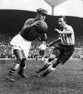 Alex Wilson, the Arsenal goalkeeper, beating Ellis Rimmer, of Sheffield Wednesday Alex Wilson, the Arsenal goalkeeper, beating Ellis Rimmer, of Sheffield Wednesday