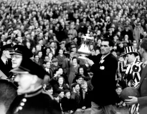 Newcastle United manager Joe Harvey with the FA Cup parading through the streets of Newcastle Newcastle United manager Joe Harvey with the FA Cup parading through the streets of Newcastle
