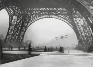 Ship Prints: Flying under the Eiffel Tower Print, 1926