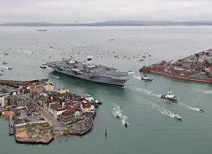 Britains future flagship HMS Queen Elizabeth sailed into her home port of Portsmouth Britains future flagship HMS Queen Elizabeth sailed into her home port of Portsmouth