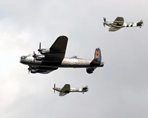 A flypast of three planes from the Battle of Britain Memorial Flight during A flypast of three planes from the Battle of Britain Memorial Flight during