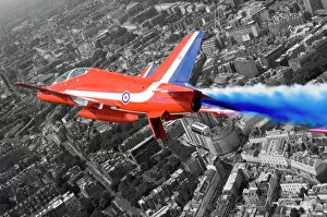 Images Dated 17th June 2006: A Hawk T1A from the Red Arrows roars over London during a flypast for the Queen s