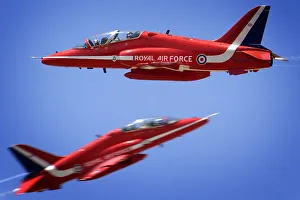 Two Hawks from the Red Arrows pass within feet of each other whilst practising the Two Hawks from the Red Arrows pass within feet of each other whilst practising the