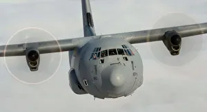 A Hercules Transporter Aircraft of 30 Squadron is shown in flight