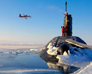 HMS Tireless is shown surfacing in the North Pole ice cap region HMS Tireless is shown surfacing in the North Pole ice cap region