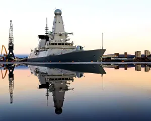 Print of HMS Defender alongside Glasgow