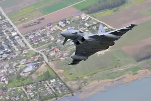 Print of a Royal Air Force Typhoon FGR4 in flight over Lithuania