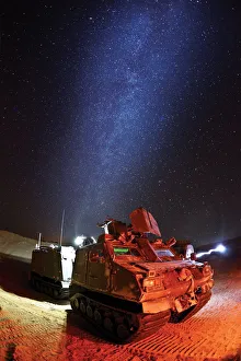 Royal Marines Viking amphibious vehicle under the Mojave Desert night sky Royal Marines Viking amphibious vehicle under the Mojave Desert night sky