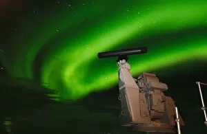 Images Dated 7th March 2004: ROYAL NAVY Goalkeepr Close in Weapon System (CIWS) with Northern Lights