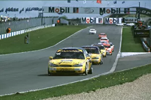 Images Dated 25th April 2000: Alain Menu leads the other Mondeos and the rest of the field