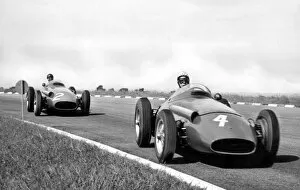 Images Dated 26th November 2002: Buenos Aires, Argentina. 19th January 1958: Jean Behra, leads Juan Manuel Fangio, action