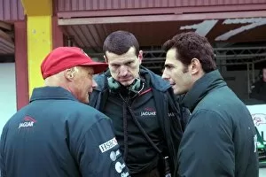 Images Dated 13th January 2002: Formula One Testing: Jaguar Team Principal Niki Lauda discusses his experience in the Jaguar R2