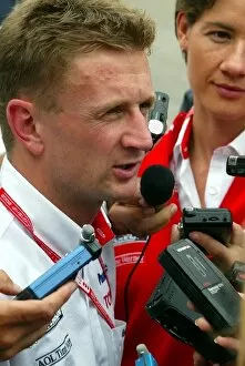 Images Dated 29th August 2002: Formula One World Championship: Allan McNish faces the media following Toyotas decison to not use