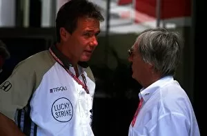 Images Dated 25th June 2001: Formula One World Championship: Craig Pollock BAR Managing Director talks with F1 supremo Bernie