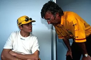 Images Dated 9th April 2002: Formula One World Championship: Giancarlo Fisichella has a discussion with Team Boss Eddie Jordan