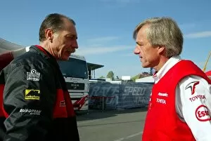 Images Dated 12th May 2002: Formula One World Championship: Gustav Brunner Toyota Technical Director talks with one of his