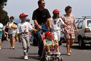 Images Dated 23rd May 2001: Formula One World Championship: Nigel Mansell with wife Roseanne and family enjoying a walk