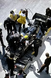 Images Dated 13th March 2002: Formula One World Championship: Race winner Ayrton Senna Lotus 98T in the pits with his mechanics