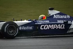 Images Dated 25th January 2002: Formula One World Championship: Ralf Schumacher shows the Williams BMW FW24 for the first time in